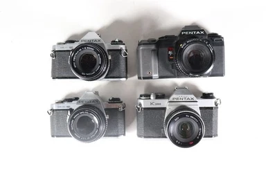 Lote de 4 cámaras réflex vintage Pentax 35 mm - K1000, ME Super (x2), SF1 con 50 mm c3 Foto 1 de 4