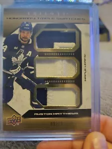 2023-24 Upper Deck Trilogy Honorary Triple Swatches Auston Matthews 09/15 - Picture 1 of 2
