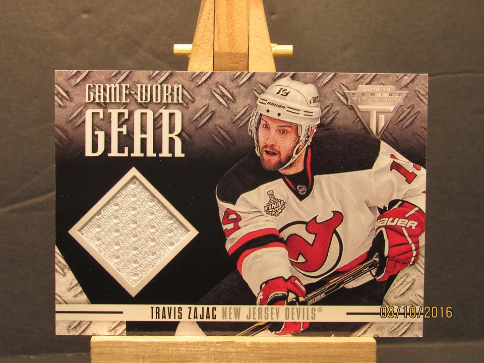 2012-13 Panini Titanium Game Worn Gear #GGTZ Travis Zajac - Image 1 of 1