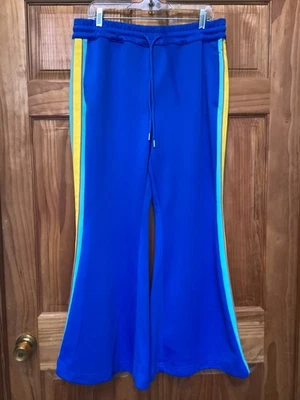 Pantalones deportivos Free People talla L azules a rayas acampanados movimiento pierna ancha Foto 1 de 4