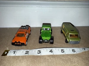 Three Matchbox Die Cast Cars (Chevy Van, MBX, Emergency Rescue) - Picture 1 of 5