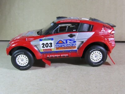 271X SOLIDO MITSUBISHI MOTORS PAJERO EVOLUTION #203 PARIGI DAKAR 2004 ATS 1:43 - Immagine 1 di 4