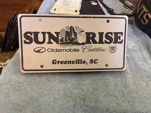 Plastic Dealership License Plate Sunrise Olds Cadillac Greenville SC - Picture 1 of 2