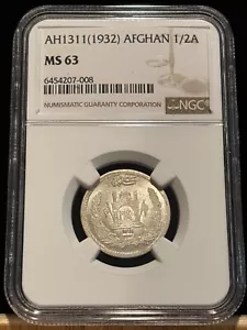 AFGHANISTAN 1/2 Afghani 1311 (1932), Silver, NGC MS 63, Choice UNC, Lustrous. K8 - Picture 1 of 2