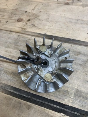 Husqvarna 335XPT Flywheel Used OEM 503790603 - Image 1 of 4