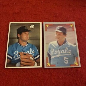 1985 George Brett Topps Sticker #268 and 1986 Topps Sticker #157
