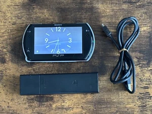 PSP Go PSP-N1000 Console Piano Black W/ Charger, Soft case, 16GB memory card - Picture 1 of 22