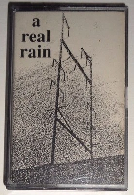 A REAL RAIN - Rare Demo Cassette 1990 Jeffrey Hack, Kevin Butler, Patrick Austin - Image 1 of 4