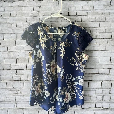 Blusa de encaje floral azul marino para mujer talla mediana Foto 1 de 3