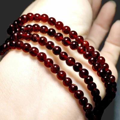 Brazalete eléctrico elástico con cuentas cristales de piedras preciosas rojo pulido granate de 4 mm Foto 1 de 4