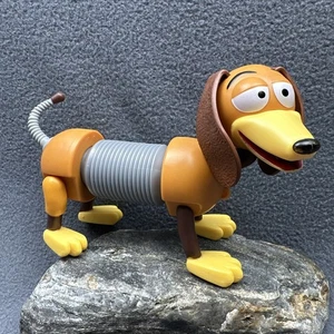 Mattel Disney Toy Story Modellino Slinky Dog Tube Body Poseable 2017 - Foto 1 di 14