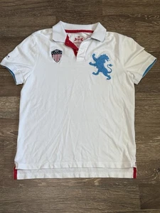 Express Herren Gr. L Kurzarm Poloshirt weiß mit großem himmelblauen Löwen & Flagge Logo - Bild 1 von 4