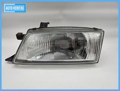 Headlight left Suzuki EG Baleno 1.3 with LWR - Image 1 of 4