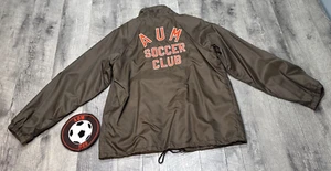Chaqueta cortavientos vintage años 80 castaño rojizo para hombre mediana AUM fútbol nailon con parche nueva sin etiquetas - Imagen 1 de 19