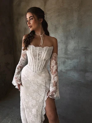 Vestidos de novia vintage de encaje vestidos de novia sin tirantes batas sin espalda descubiertas del hombro Foto 1 de 4
