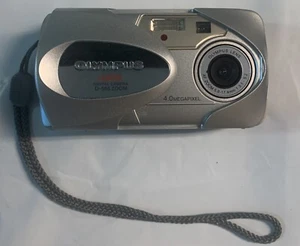 OLYMPUS CAMEDIA D-565 SILVER ZOOM 4.0 MP DIGITAL CAMERA Tested Working w/Card - Picture 1 of 4