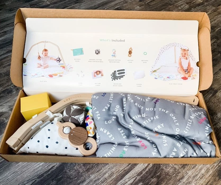 Lovevery Play Gym: Estera de bebé de desarrollo Montessori ecológica y gimnasio de actividades Foto 1 de 1