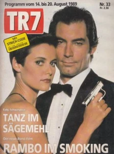 TR7 Schweiz 89/33 Jörg Knör,James Bond mit Timothy Dalton,Carey Lowell  - Bild 1 von 3
