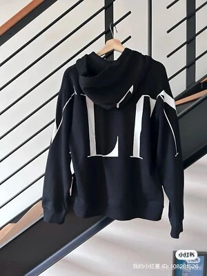Jersey con capucha estampado marca Valentino hombro caído mezcla algodón pequeña Foto 1 de 3
