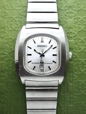 RELOJ SEIKO VINTAGE c. 1975 día-fecha automático 19 joyas 7006-5070 repuestos/reparación Foto 1 de 4