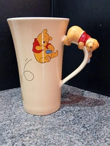 DISNEY STORE Tall Yellow Winnie The Pooh Riding Balloon Mug with Pooh on Handle - Picture 1 of 6