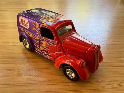 PANEL FORD ANGOLA PÚRPURA, CABEZALES HEDMAN, PILOTOS REALES, 2009 HOT WHEELS, 14/25 Foto 1 de 4