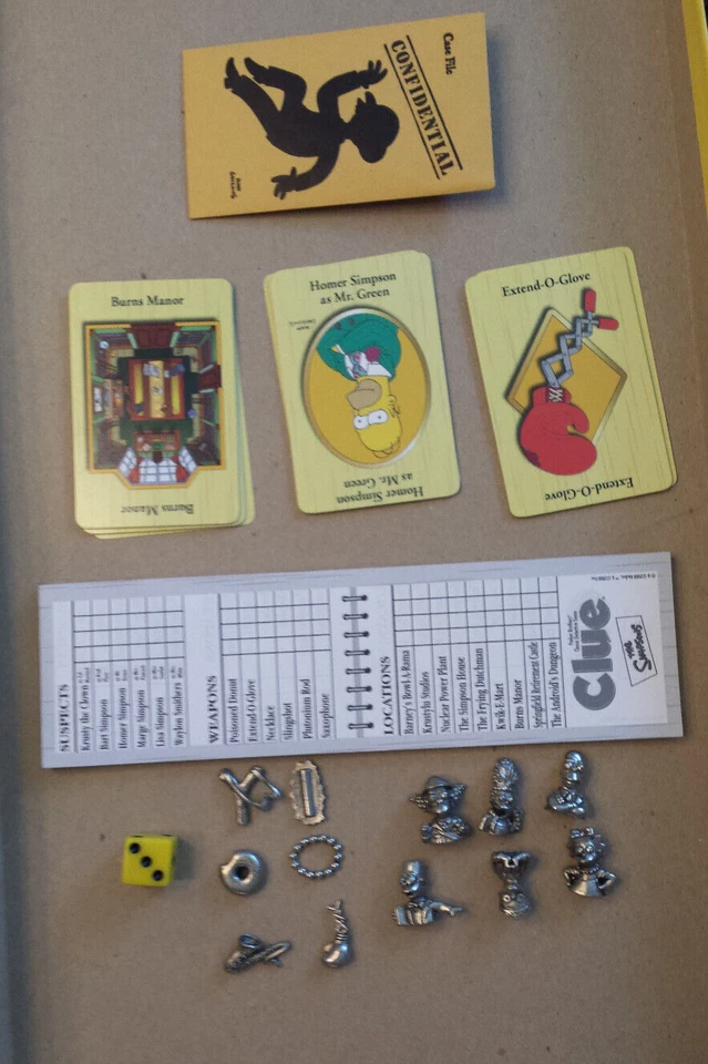 Die, Cards, Tokens, Weapons, Pad, Envelope from 2000 THE SIMPSONS CLUE game - Image 1 of 1