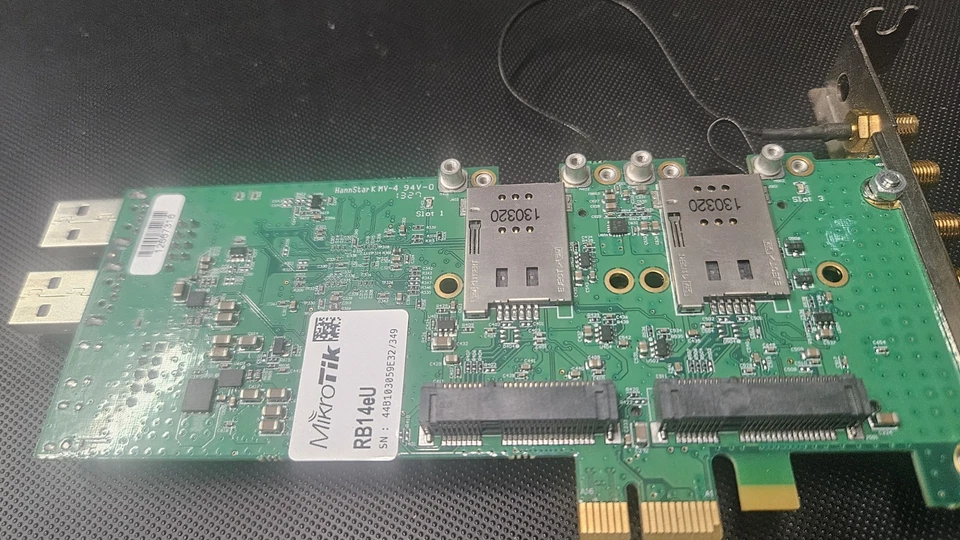 MikroTik RB14E | RouterBOARD 14e 4 slot miniPCIe adapter + 2 Telit Modules - Image 1 of 4