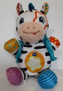 Vtech Lights and Stripes Zebra Plüschtier Stofftier musikalisch singend sensorisches Spielzeug - Bild 1 von 2