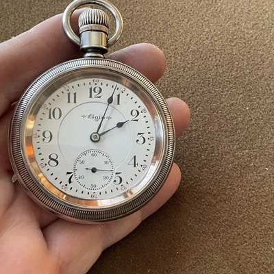 elgin veritas 18s , 23j , rail road sterling silver case ,w/gold inlayed eagle. - Photo 1/4