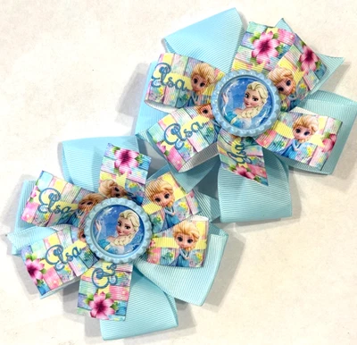 Beautiful Elsa from Disney's Frozen inspired set of pigtail hair bows for girls. - Image 1 of 2