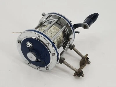 Carrete de pesca azul convencional vintage Olympic Dolphin 614 Foto 1 de 4