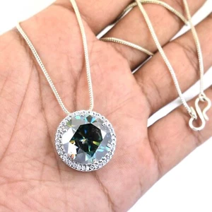 10 CT AAA CERTIFIED BLUE ROUND MOISSANITE HALO PENDANT WITH WHITE ACCENTS - Picture 1 of 7