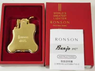 Ronson Banjo Elegante Diseño Pedernal Encendedor de Aceite Latón Dorado Original Caja Roja Japón Foto 1 de 4