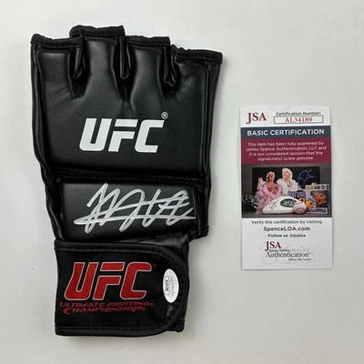 Autographed/Signed Khabib Nurmagomedov Black UFC Glove Ultimate Fighting JSA COA - Image 1 of 2