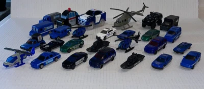 27 Juguetes Diecast y Plástico, VEHÍCULOS POLICIALES, Lote (Coches-Camiones-Barcos-Helicópteros) Foto 1 de 3