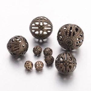 50 Iron Filigree Beads Bronze Colour Round Findings Spacer Crafts Mixed Size - Picture 1 of 2
