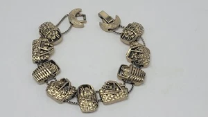 Süßes Vintage goldfarbenes Schieberarmband mit 4 verschiedenen Korbrutschen Charms - Bild 1 von 15