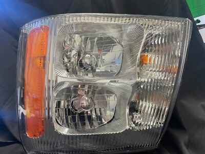 Cadillac Escalade  Left Headlight Fits 2007-2014 by Eagle Eyes - Image 1 of 2
