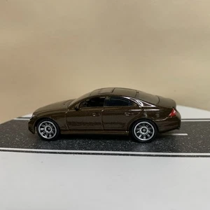 2008 Matchbox MBX VIP Rides Mercedes-Benz CLS500 Sedan Brown Metallic 1:64 NM - Picture 1 of 12