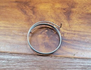 DeWALT SPRING TORSION FOR DCS570 DCS573 DCS574 DCS578 7-¼  Circular saw N100006 - Picture 1 of 2