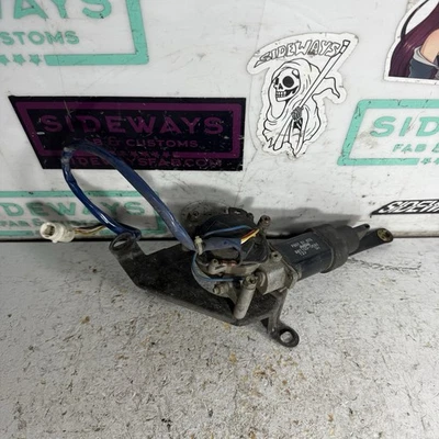 Motor e suporte para farol dianteiro esquerdo Mazda RX7 86-91 FC - Imagem 1 de 4