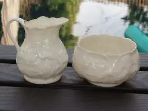 Crema y tazón de azúcar abierto Belleek Ireland Lotus en excelente estado - Imagen 1 de 5
