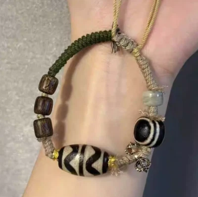 Pulsera Tibetana Antigua Meteorización DZI Cuerda de Mano Madera de Agila Cobre Puro Buda Cuentas Foto 1 de 3
