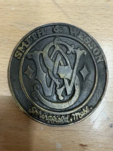 Vintage 70s Smith & Wesson S&W Belt Buckle Solid Brass Round 2 1/2 inches - Picture 1 of 2