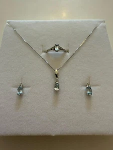 Parure COLLANA PUNTO LUCE ORECCHINI ANELLO ORO BIANCO 18 KARATI 750% E ZIRCONI - Imagen 1 de 11