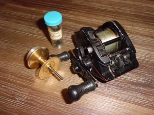 Vintage SHIMANO Bantam Magnumlite 2000 Baitcasting Reel made in Japan w/ Extras - Picture 1 of 9