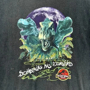 T-shirt nera punto singolo promo film Jurassic Park vintage anni 90 LEGGI - Foto 1 di 18