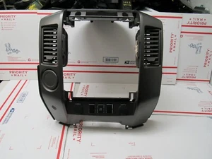 2013 2014 2015 NISSAN TITIAN RADIO BEZEL DASH TRIM WITH AIR VENTS - Bild 1 von 10