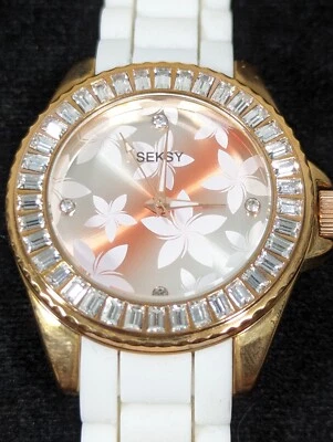 Seksy Womans Star Dial Crystal Accent Gold Tone Round Case White Band Watch 8 in - Image 1 of 4